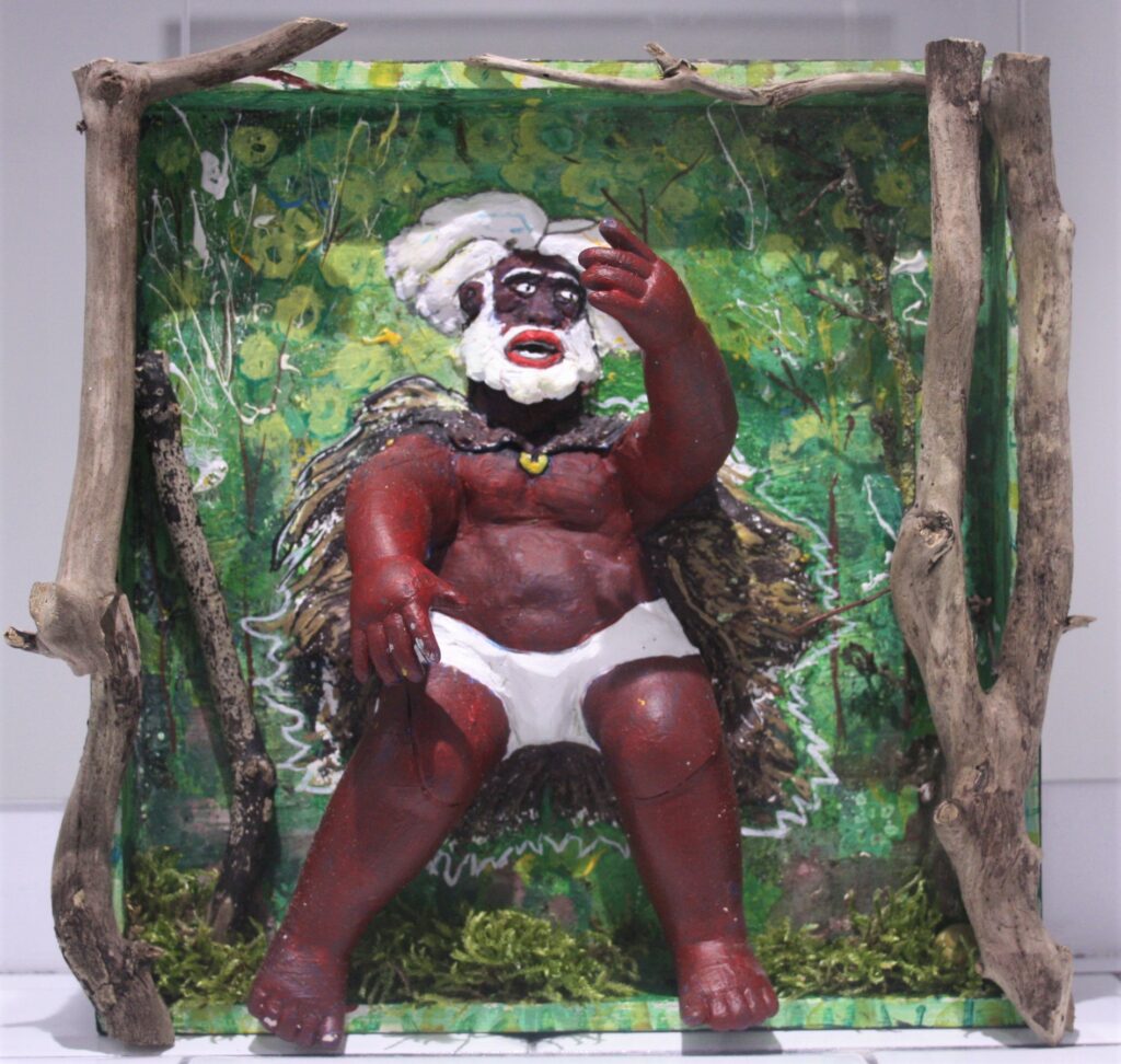 Arman Henderson's: 3d doll painting; note Mryddth madman off the woods?